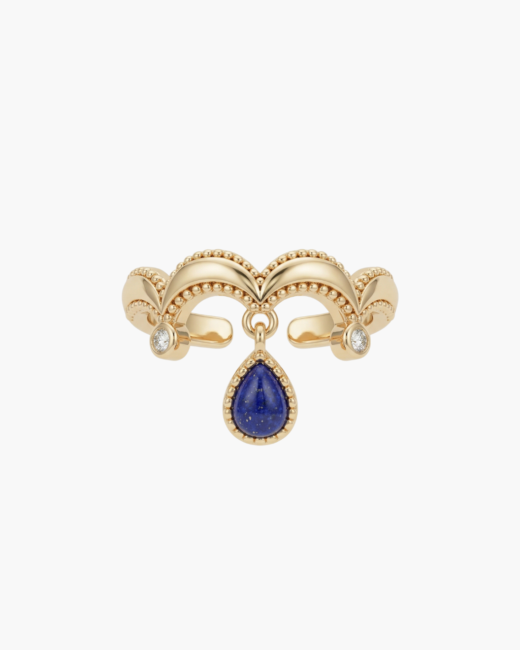 Close-up of a vintage gold crown-style S925 silver ring with a dangling teardrop natural lapis lazuli stone.