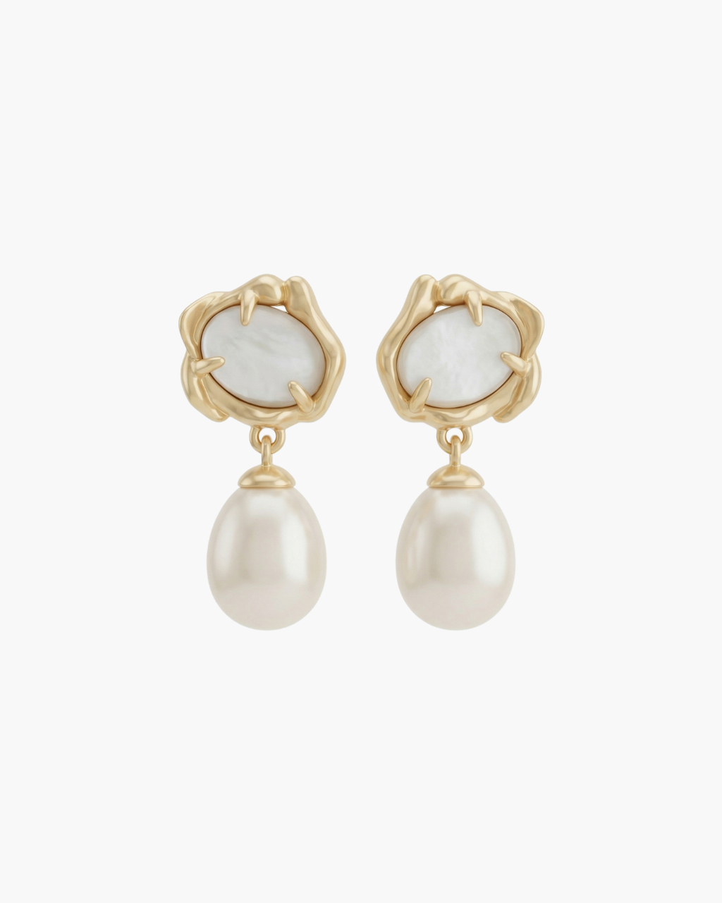 Macro shot of molten gold earrings with white mother of pearl center and teardrop pearl dangles.