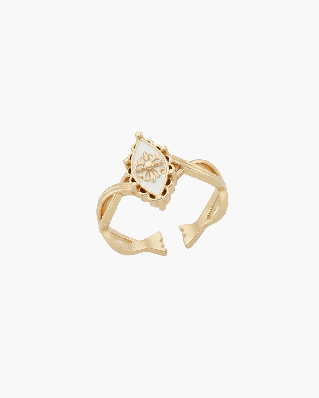 Front view of a vintage gold S925 silver ring with a white enamel marquise centerpiece and embossed floral patterns on a white display.