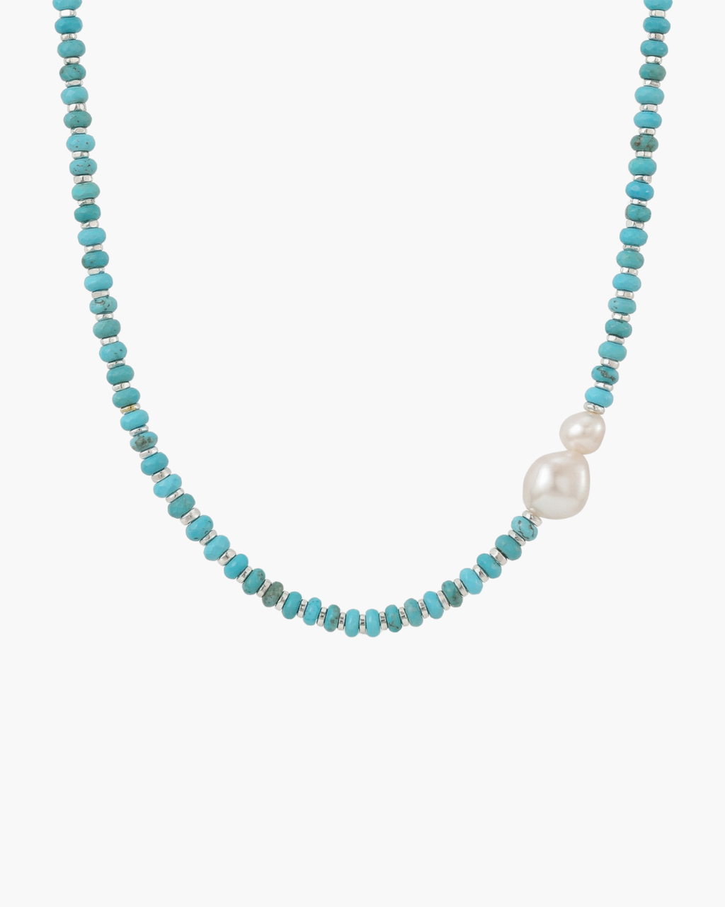 Top view of a natural turquoise beaded necklace featuring two irregularly shaped baroque pearls and silver lobster clasp on a white background.