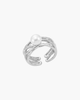 Close-up of a gold-plated entwined multi-band S925 silver ring featuring a central natural pearl and tiny sparkling cubic zirconia stones.