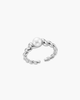 Close-up of a gold-plated twisted croissant-style S925 silver ring with a central natural pearl on a white display stand.
